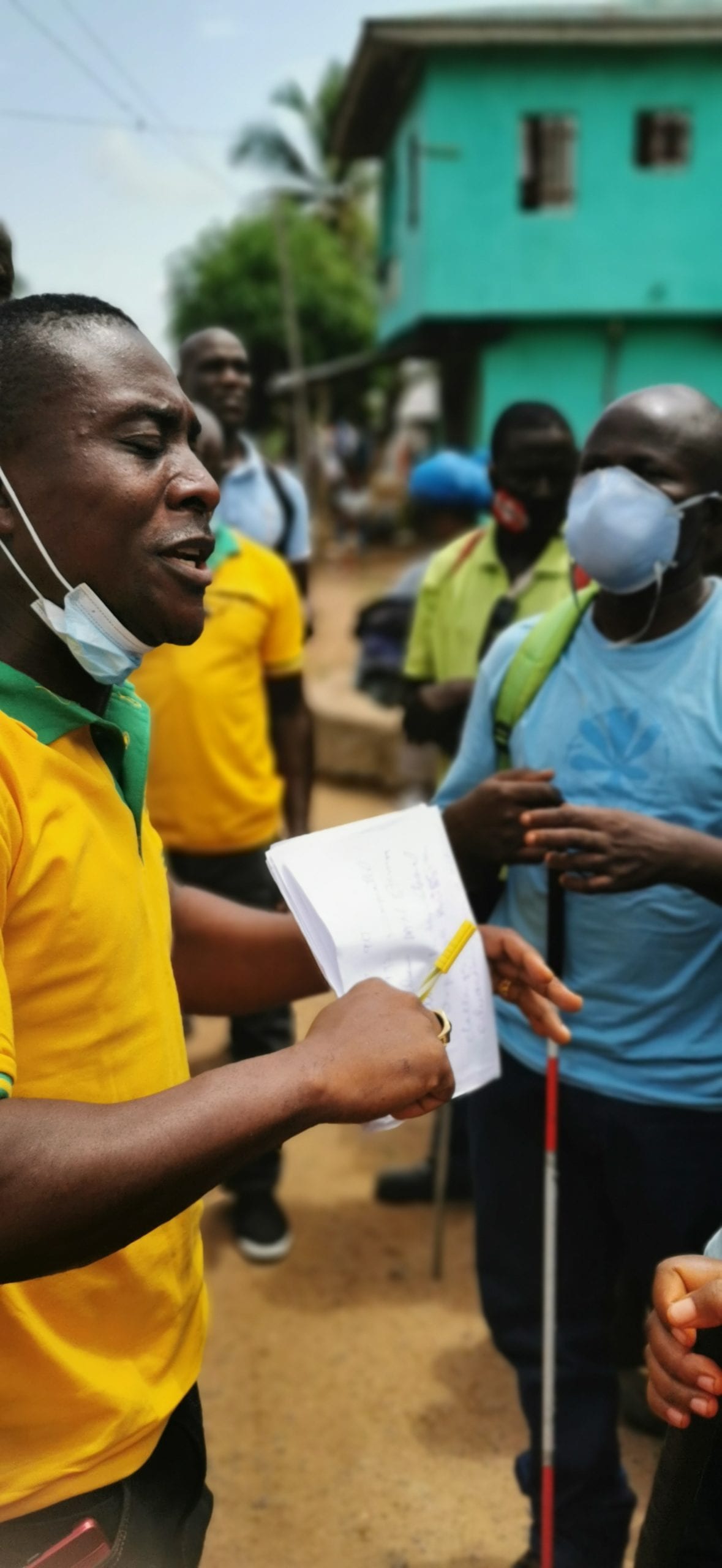 Man sharing the gospel in Liberia